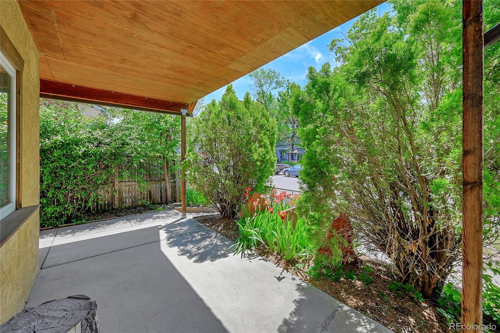 944 Inca Street Denver, CO 80204 - Photo 7 of 29 a backyard of a house with lots of green space