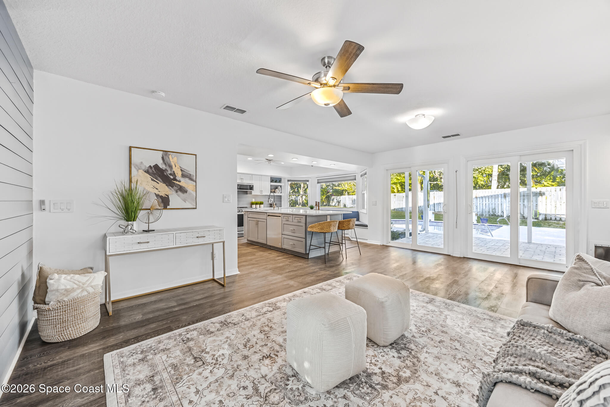 3069 Rio Bonita Street Indialantic, FL 32903 - Photo 13 of 46 a living room with furniture and a large window