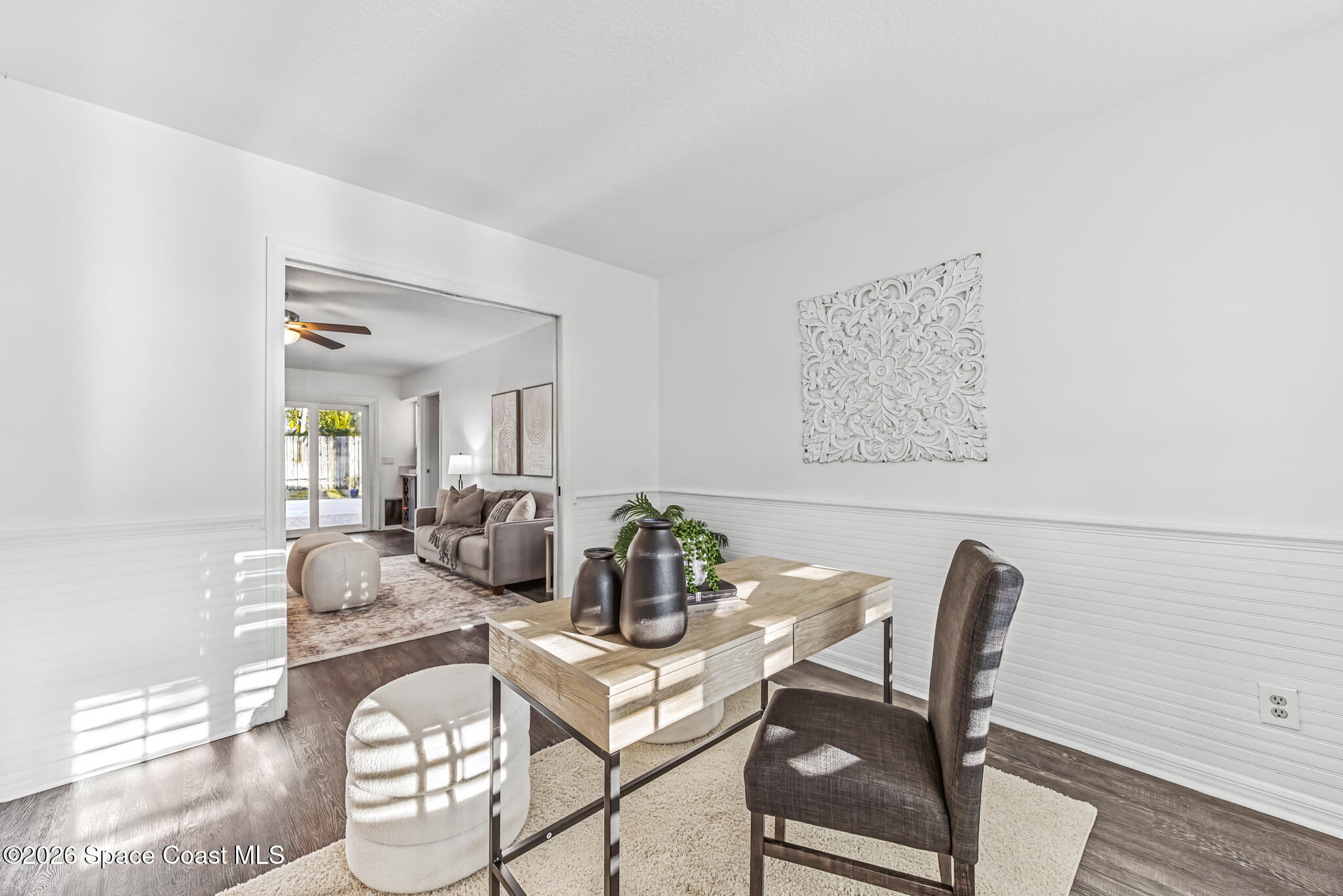 3069 Rio Bonita Street Indialantic, FL 32903 - Photo 14 of 46 a dining room with furniture and wooden floor