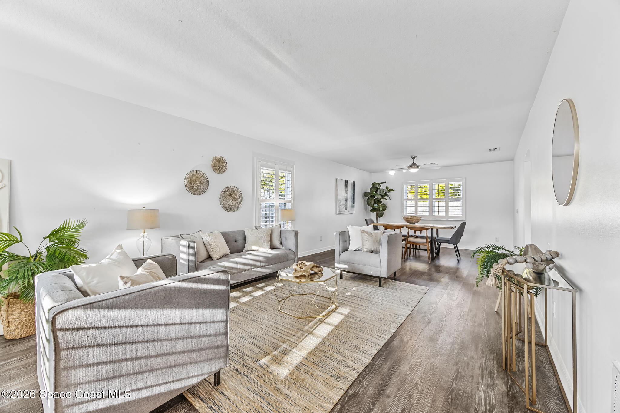 3069 Rio Bonita Street Indialantic, FL 32903 - Photo 19 of 46 a living room with furniture and wooden floor