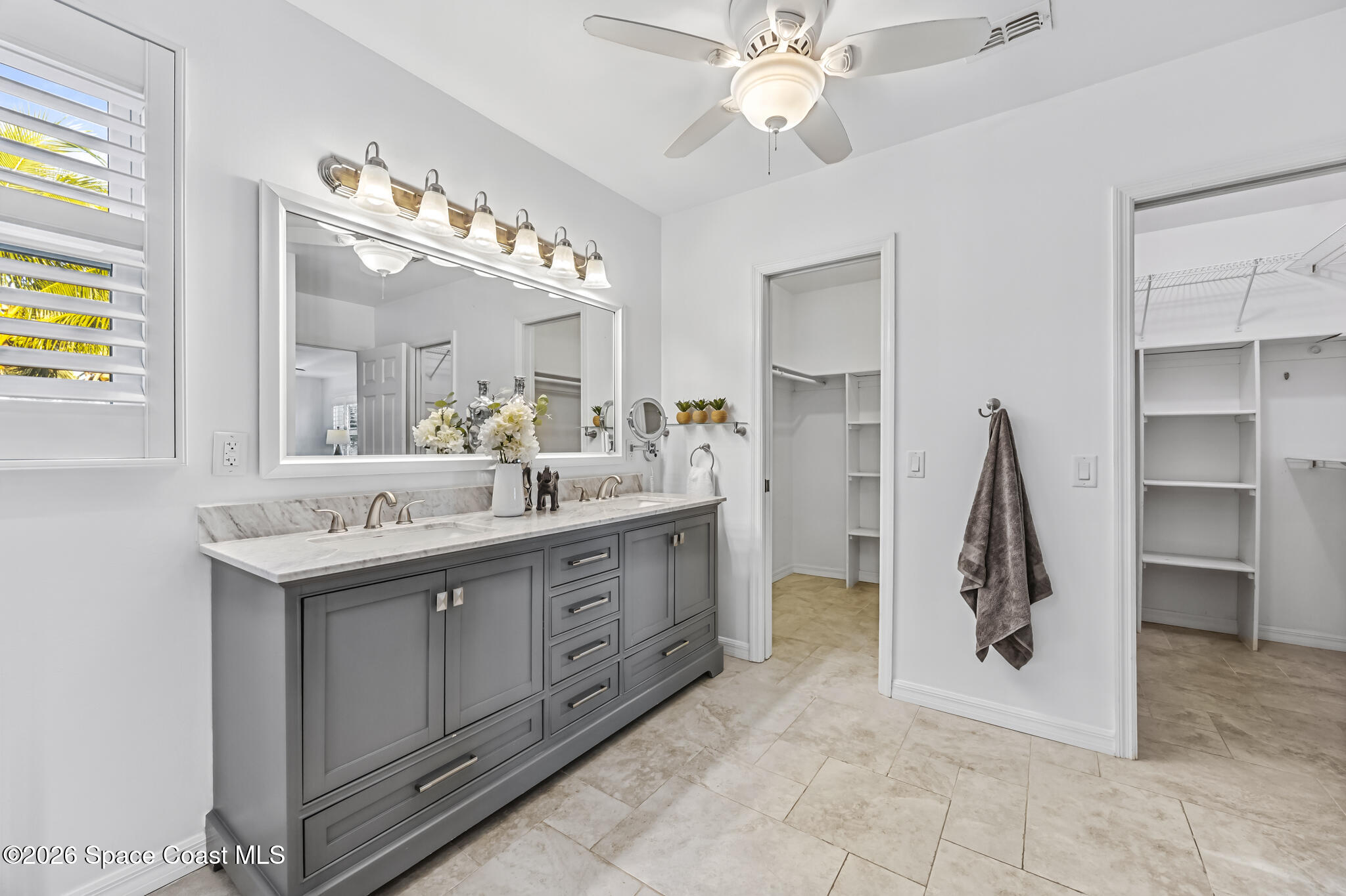 3069 Rio Bonita Street Indialantic, FL 32903 - Photo 28 of 46 a bathroom with a sink double vanity and a mirror