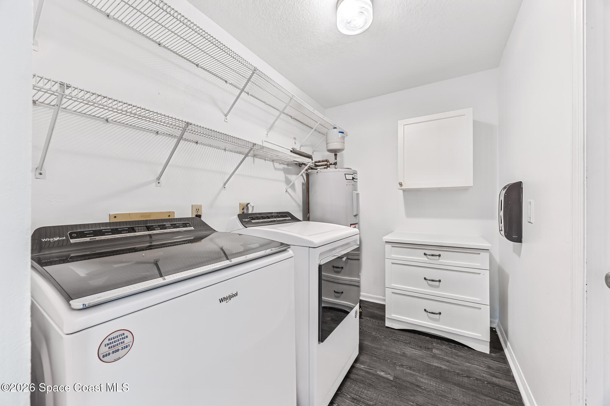 3069 Rio Bonita Street Indialantic, FL 32903 - Photo 41 of 48 a utility room with dryer and washer