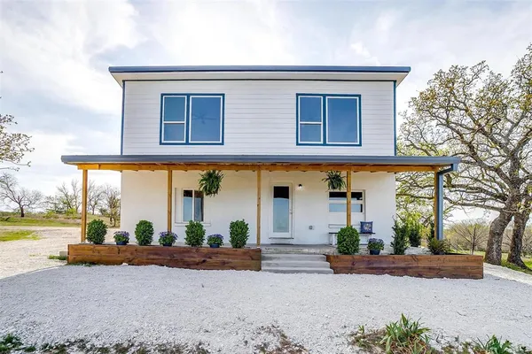 a view of a house with a patio