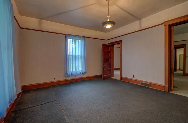 a view of an empty room with window