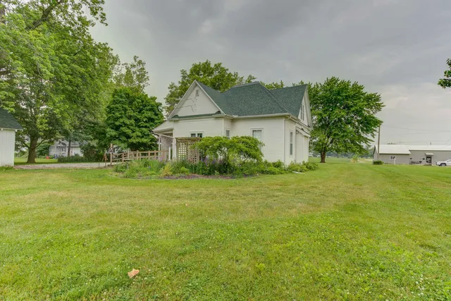 a view of a house with a big yard