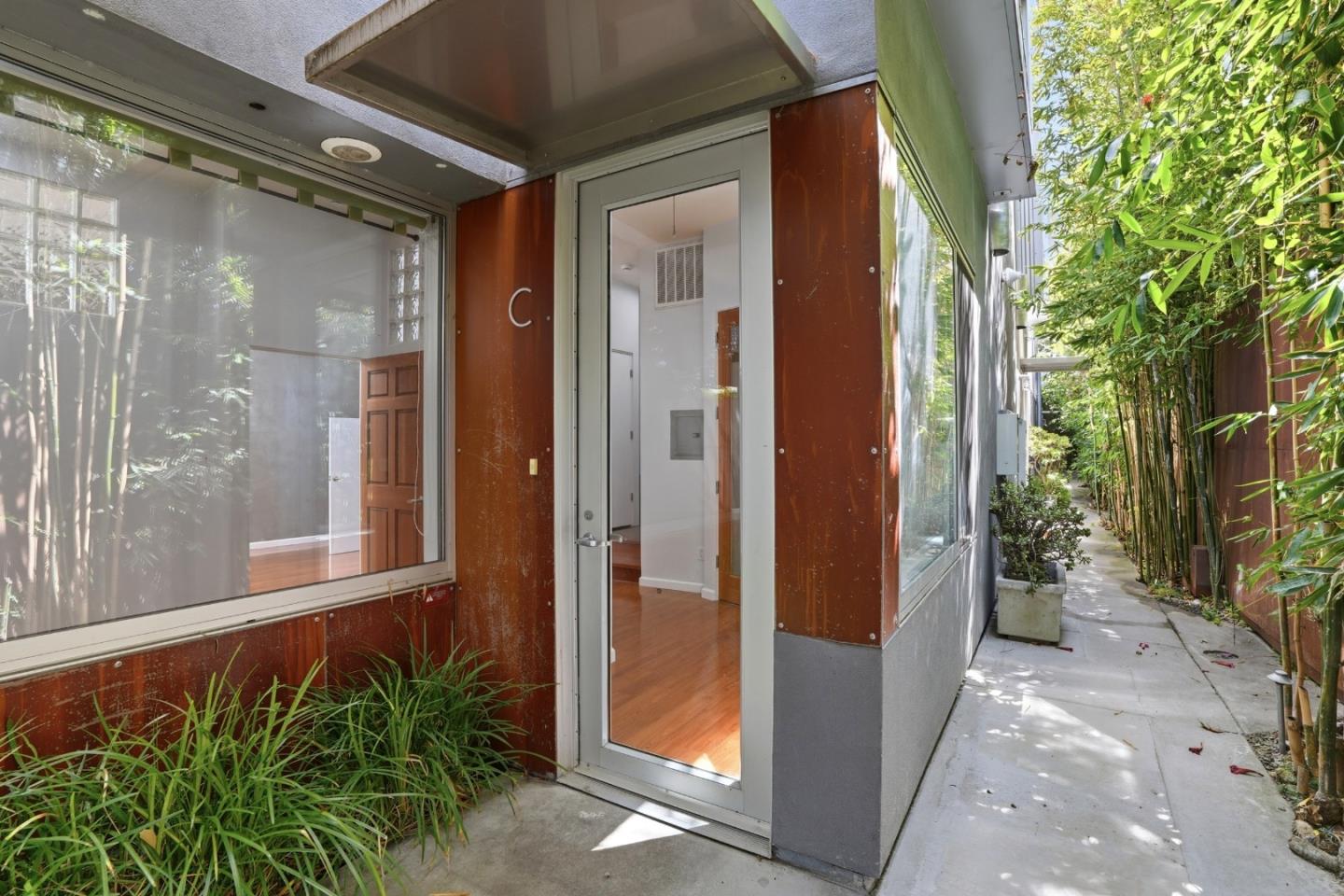 2709 Tenth Street, Unit C Berkeley, CA 94710 - Photo 5 of 44 a view of a glass door with a glass door