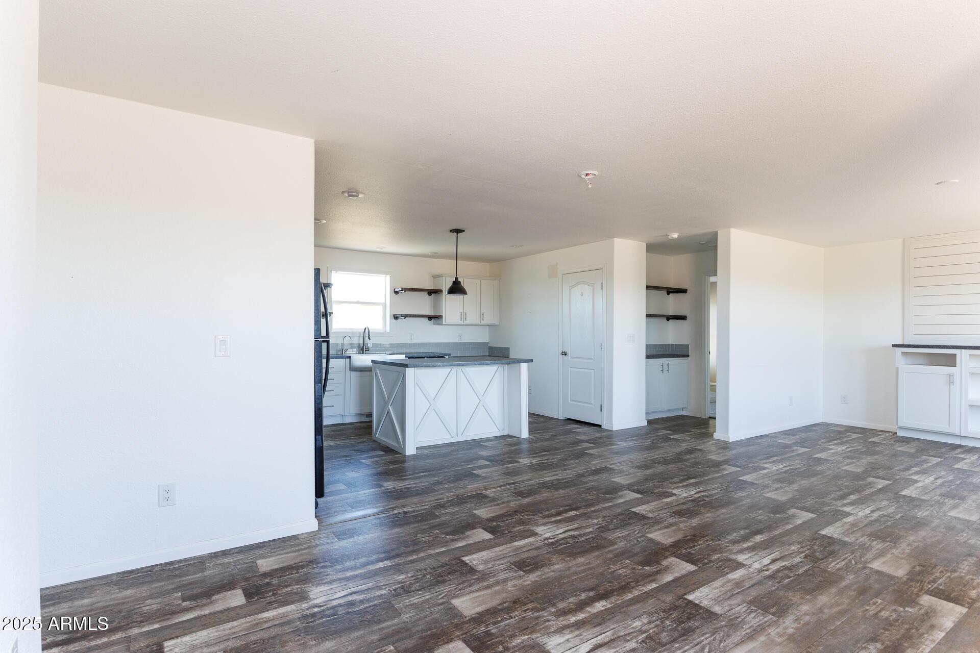 9713 South Thornton Road Casa Grande, AZ 85193 - Photo 13 of 42 a view of kitchen with wooden floor