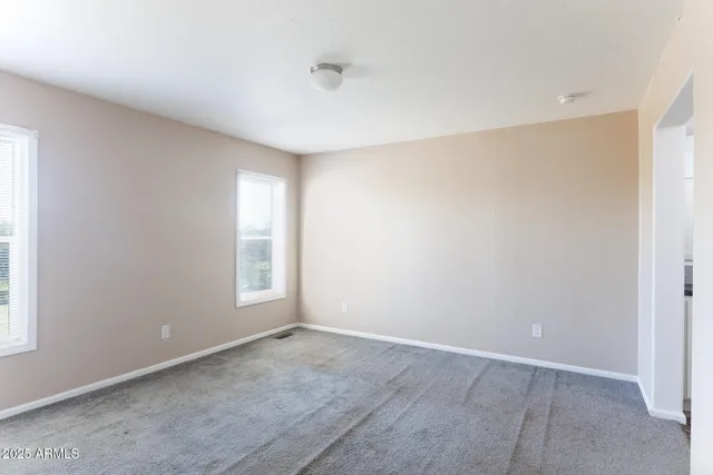a view of a room with an empty space