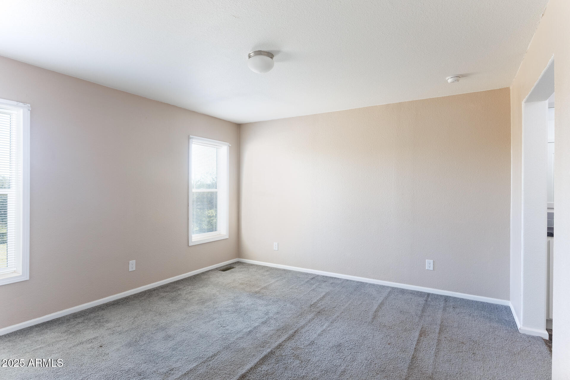 9713 South Thornton Road Casa Grande, AZ 85193 - Photo 15 of 42 a view of an empty room with a window