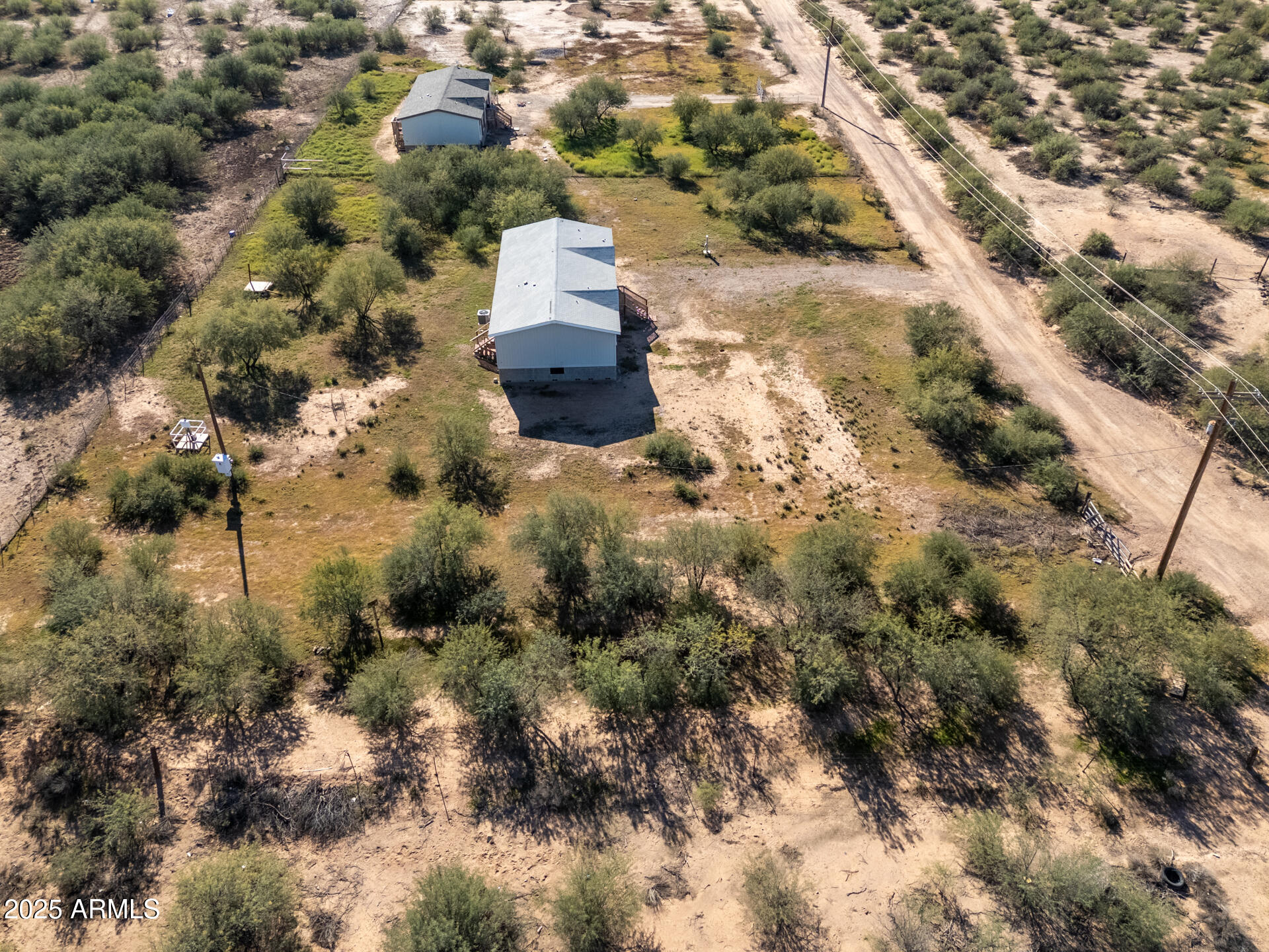 9713 South Thornton Road Casa Grande, AZ 85193 - Photo 37 of 42 an aerial view of residential houses with outdoor space