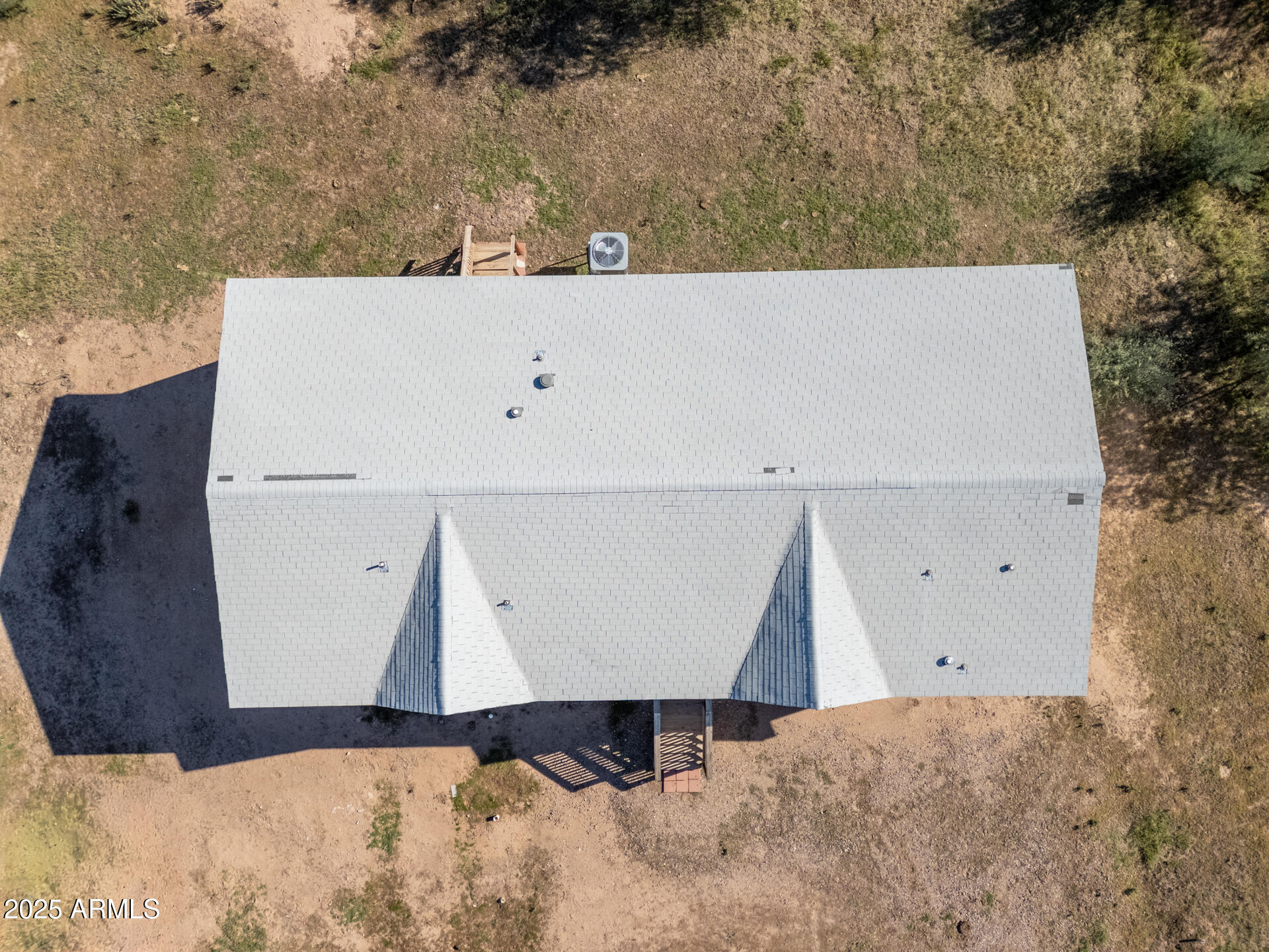 9713 South Thornton Road Casa Grande, AZ 85193 - Photo 38 of 42 an aerial view of a house with a yard