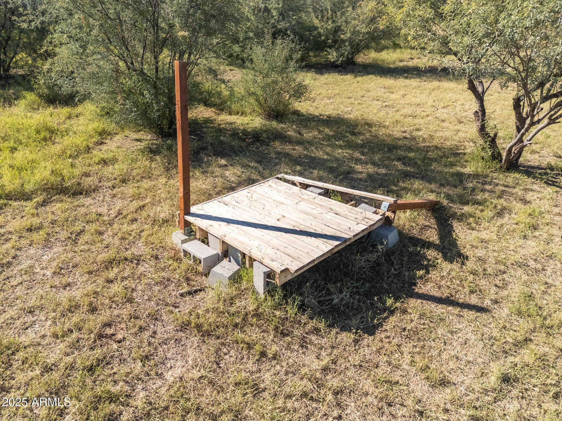 9713 South Thornton Road Casa Grande, AZ 85193 - Photo 39 of 42 a view of a terrace with a bench