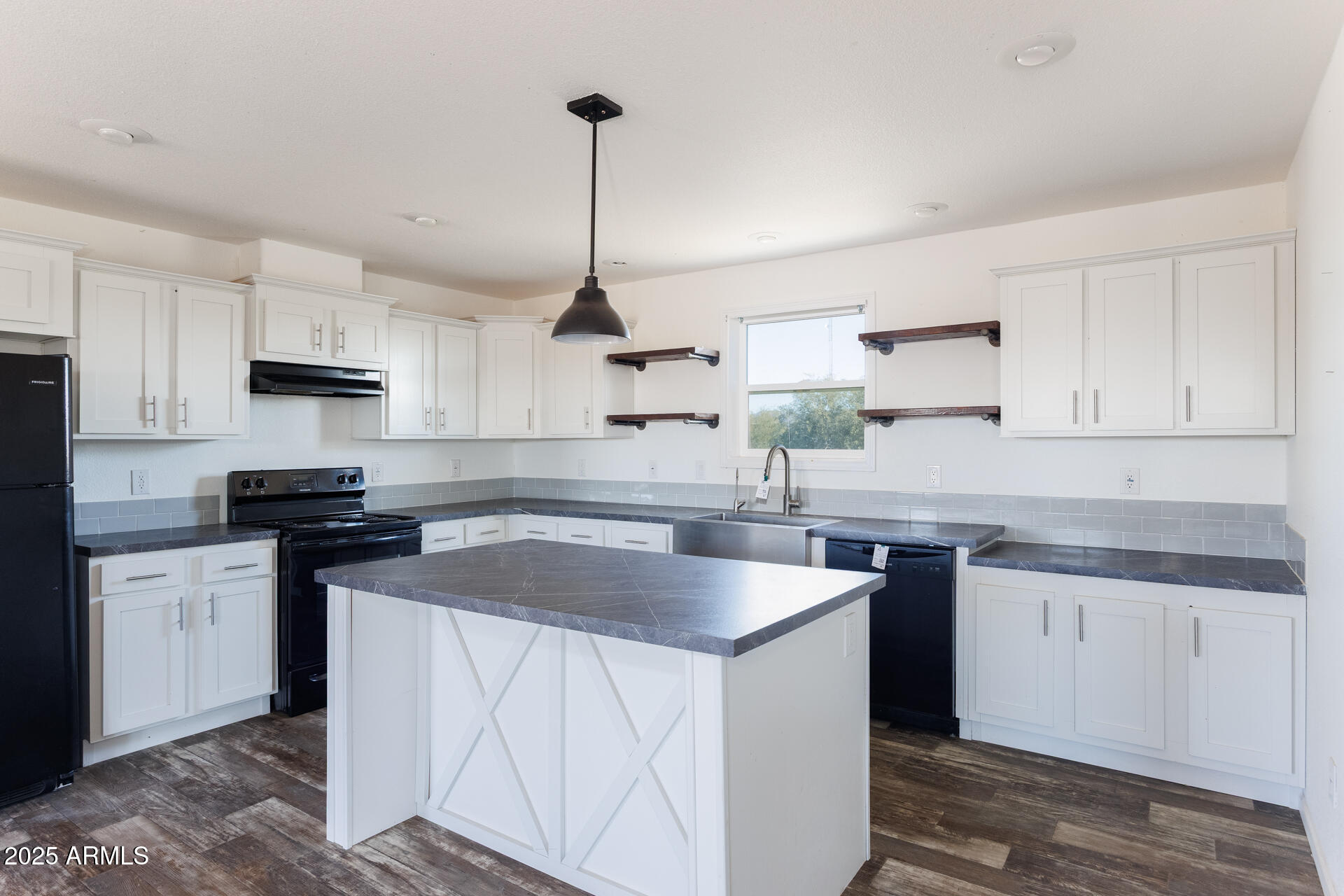 9713 South Thornton Road Casa Grande, AZ 85193 - Photo 8 of 42 a kitchen with stainless steel appliances granite countertop a sink stove and refrigerator