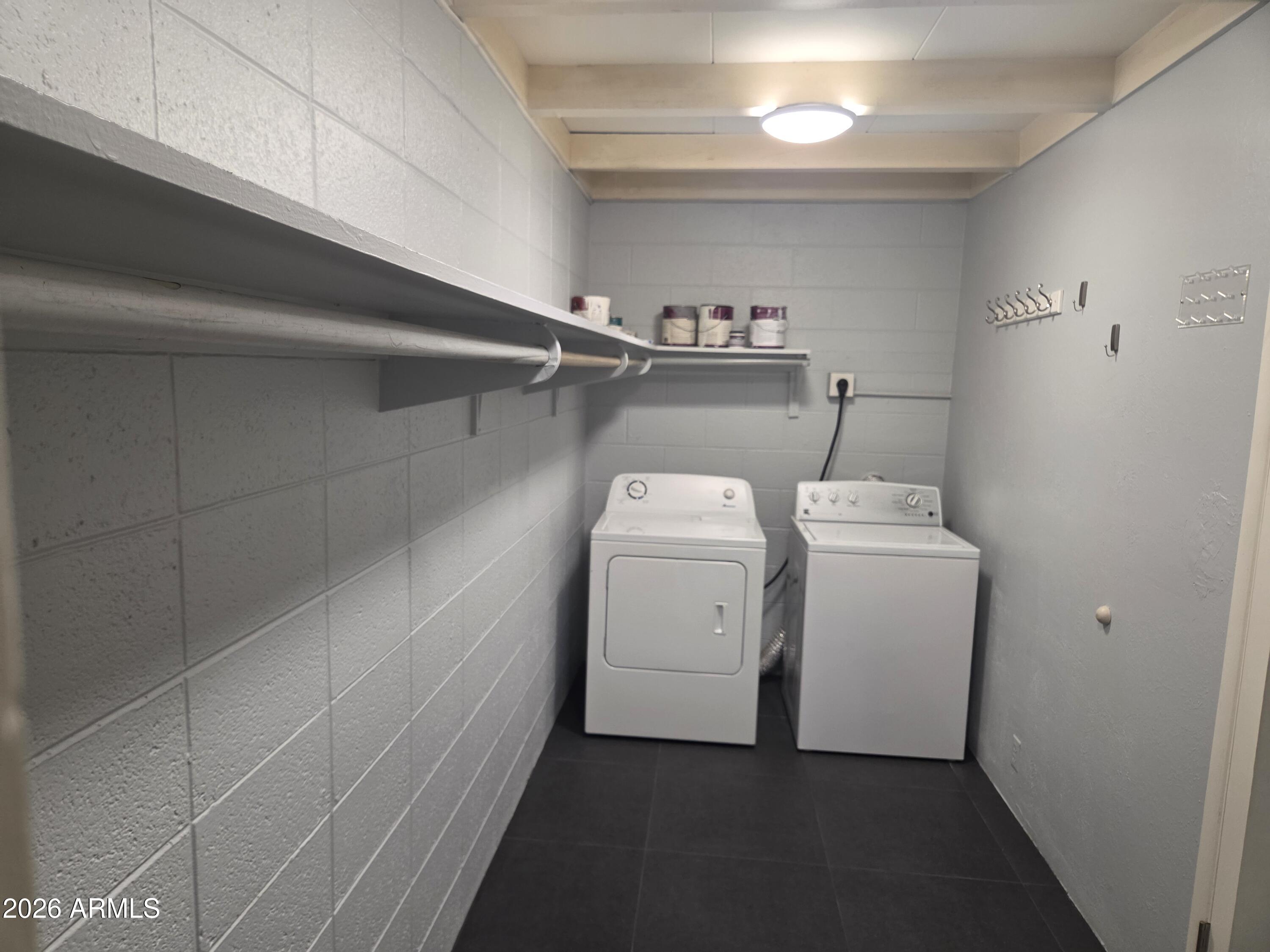 1101 East Bethany Home Road, Unit 7 Phoenix, AZ 85014 - Photo 9 of 14 a utility room with dryer and washer