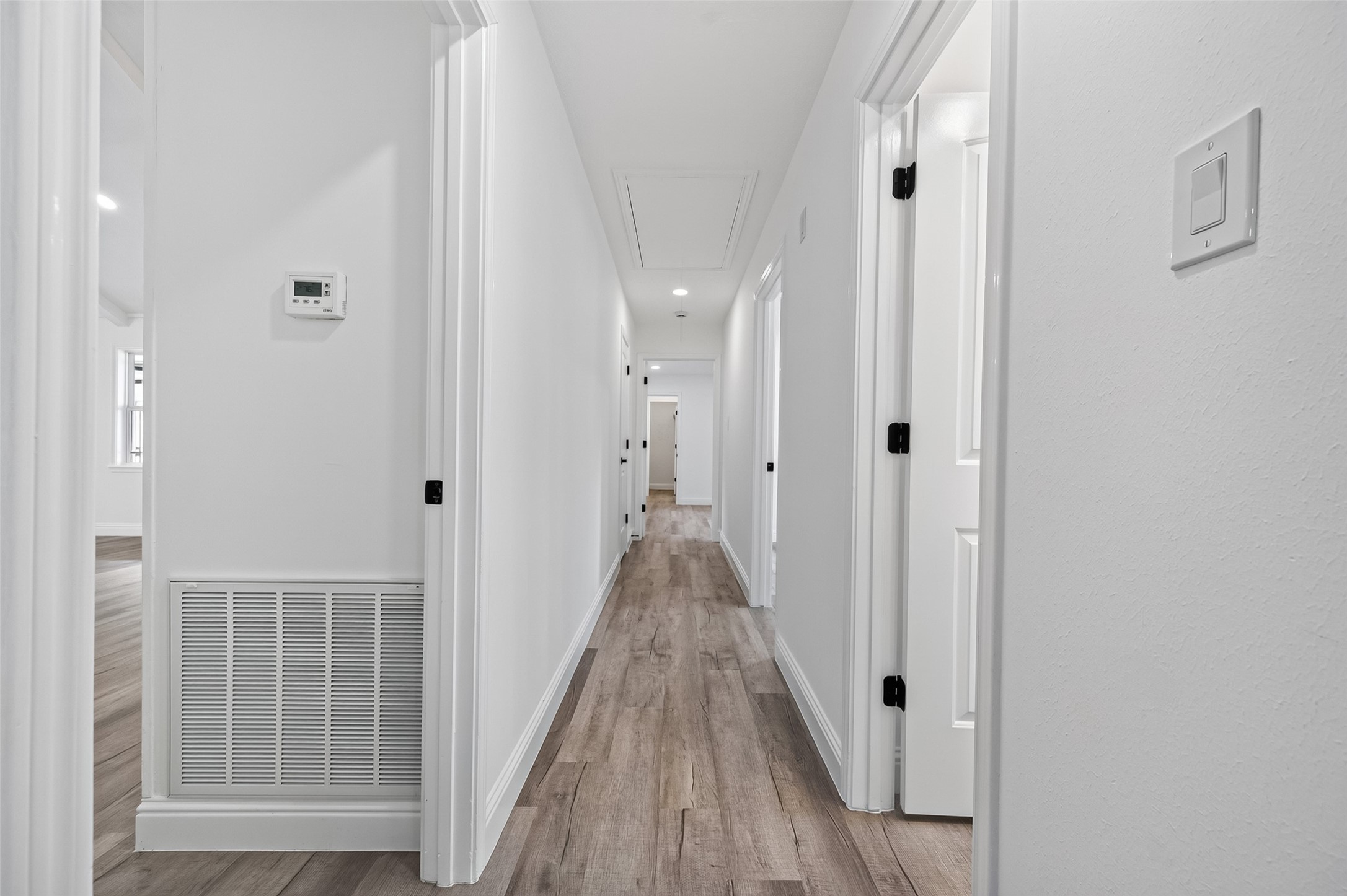 15402 Ripplestream Drive Houston, TX 77068 - Photo 27 of 50 The hallway connecting all of the bedrooms and shared bathroom