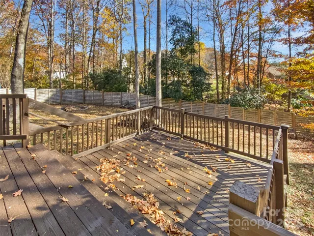 a view of balcony with wooden floor