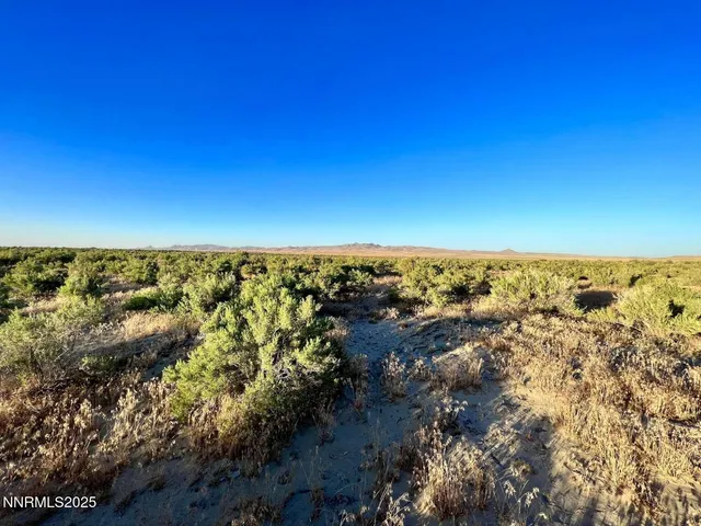 a view of lake and mountain