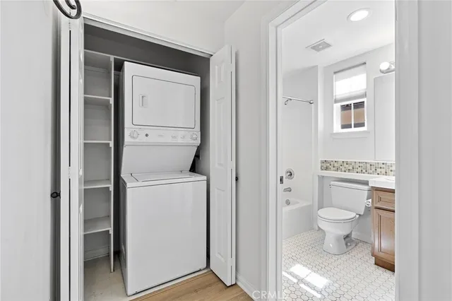 a view of bathroom with a toilet and a sink