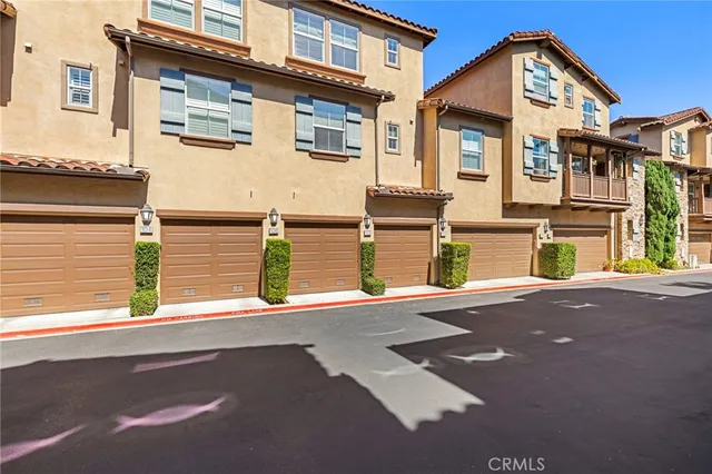 a view of a house with a street