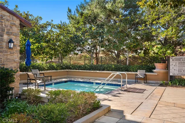 a view of a backyard with sitting area