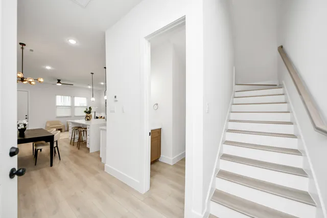 a view of a living room and entryway