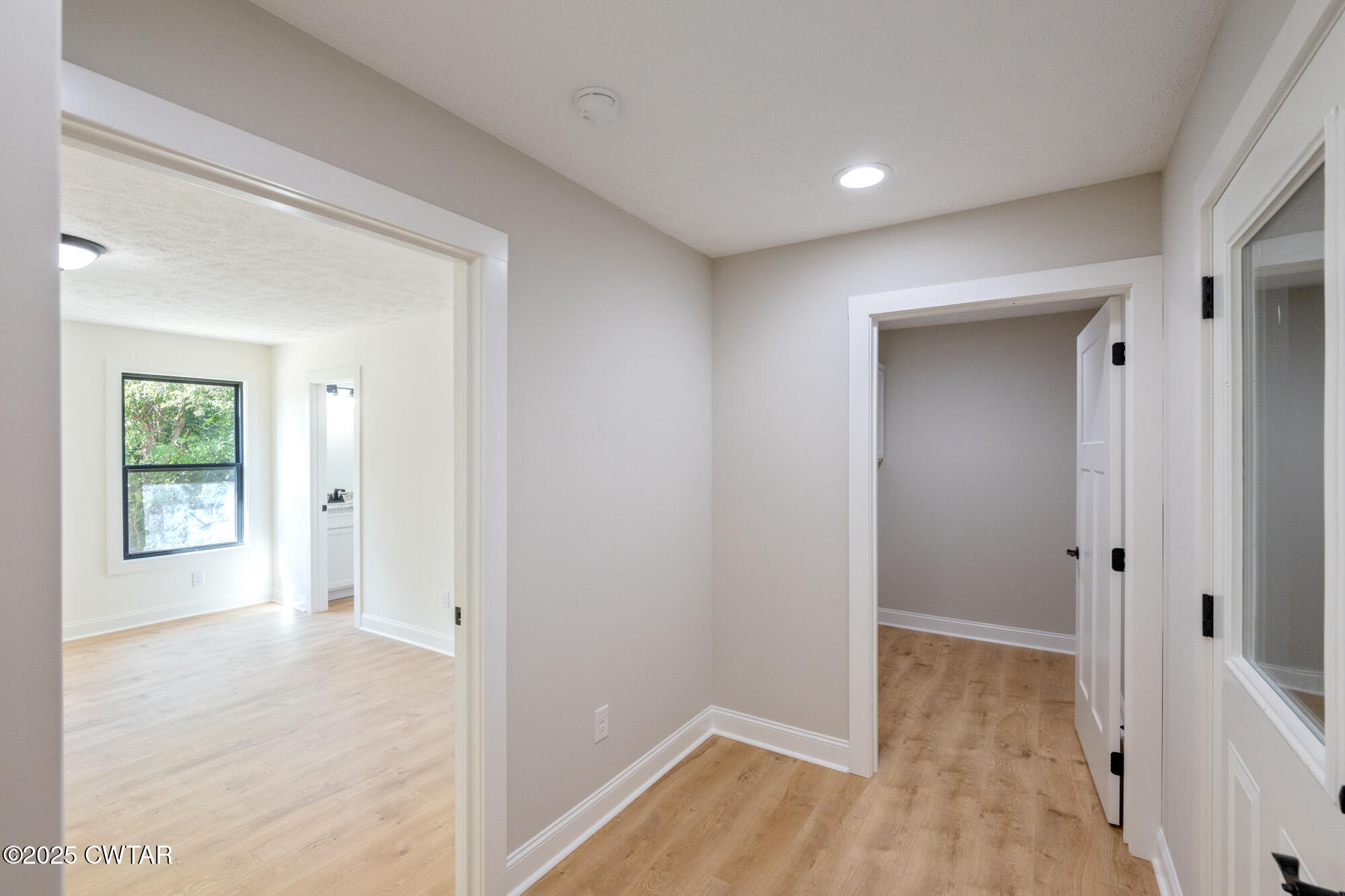 90 Derek Drive Lexington, TN 38351 - Photo 18 of 32 a view of livingroom with hardwood floor and window