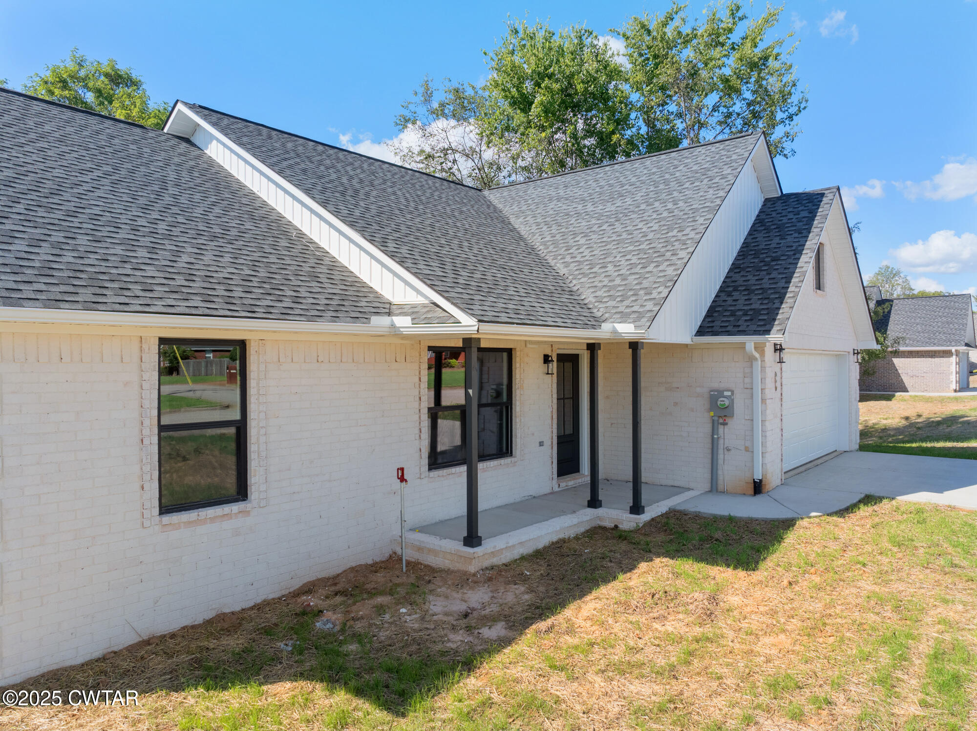 90 Derek Drive Lexington, TN 38351 - Photo 2 of 32 a view of a house with backyard