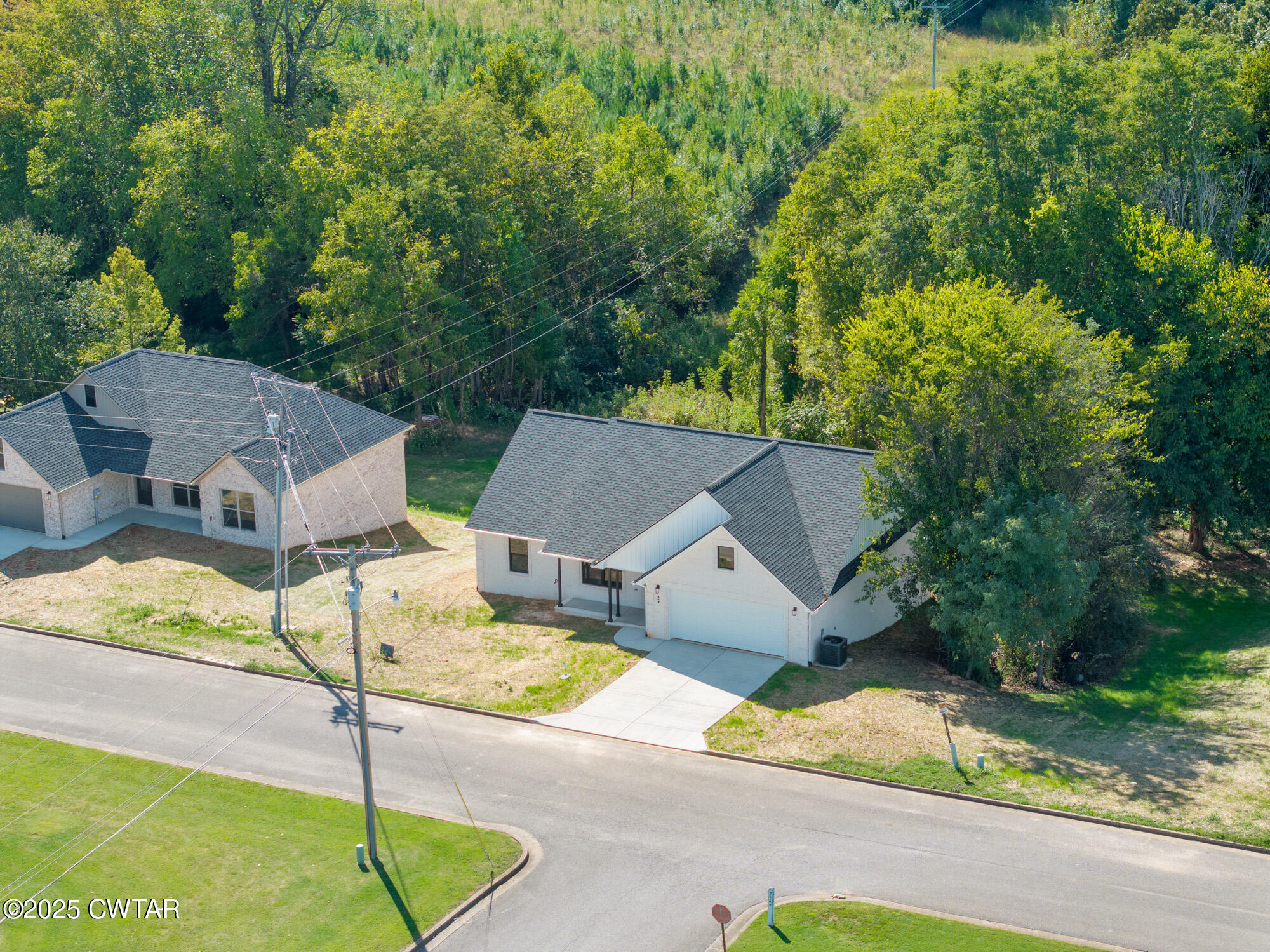90 Derek Drive Lexington, TN 38351 - Photo 6 of 32 a view of house with yard