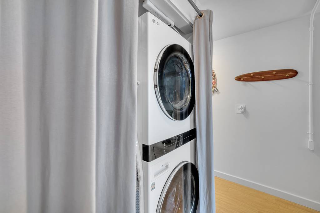 4156 Rice Street, Unit 107 Lihue, HI 96766 - Photo 17 of 29 a utility room with dryer and washer