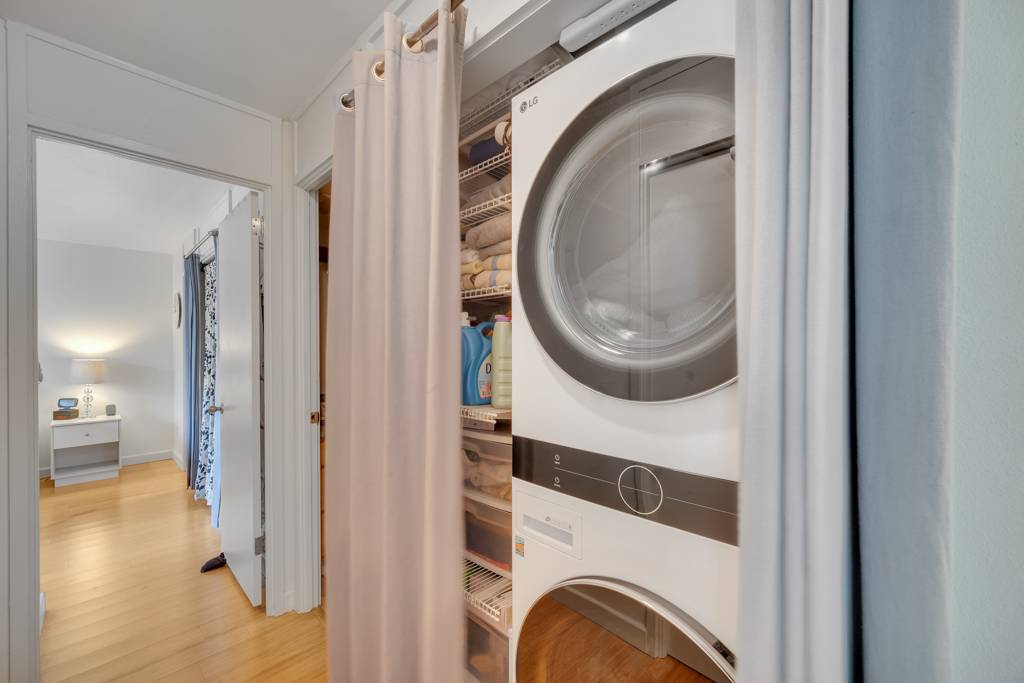 4156 Rice Street, Unit 107 Lihue, HI 96766 - Photo 18 of 29 a view of a hallway with washer and dryer