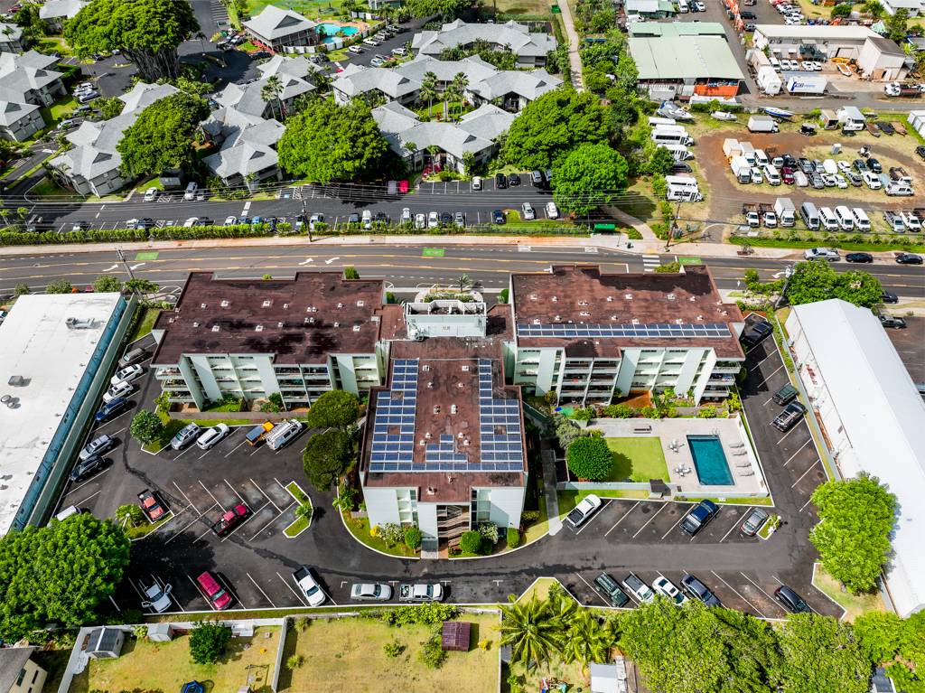 4156 Rice Street, Unit 107 Lihue, HI 96766 - Photo 26 of 29 an aerial view of a house with a swimming pool outdoor seating and yard