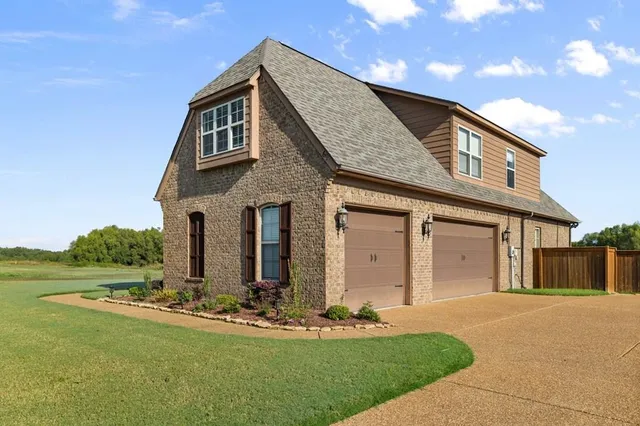 a front view of house with yard