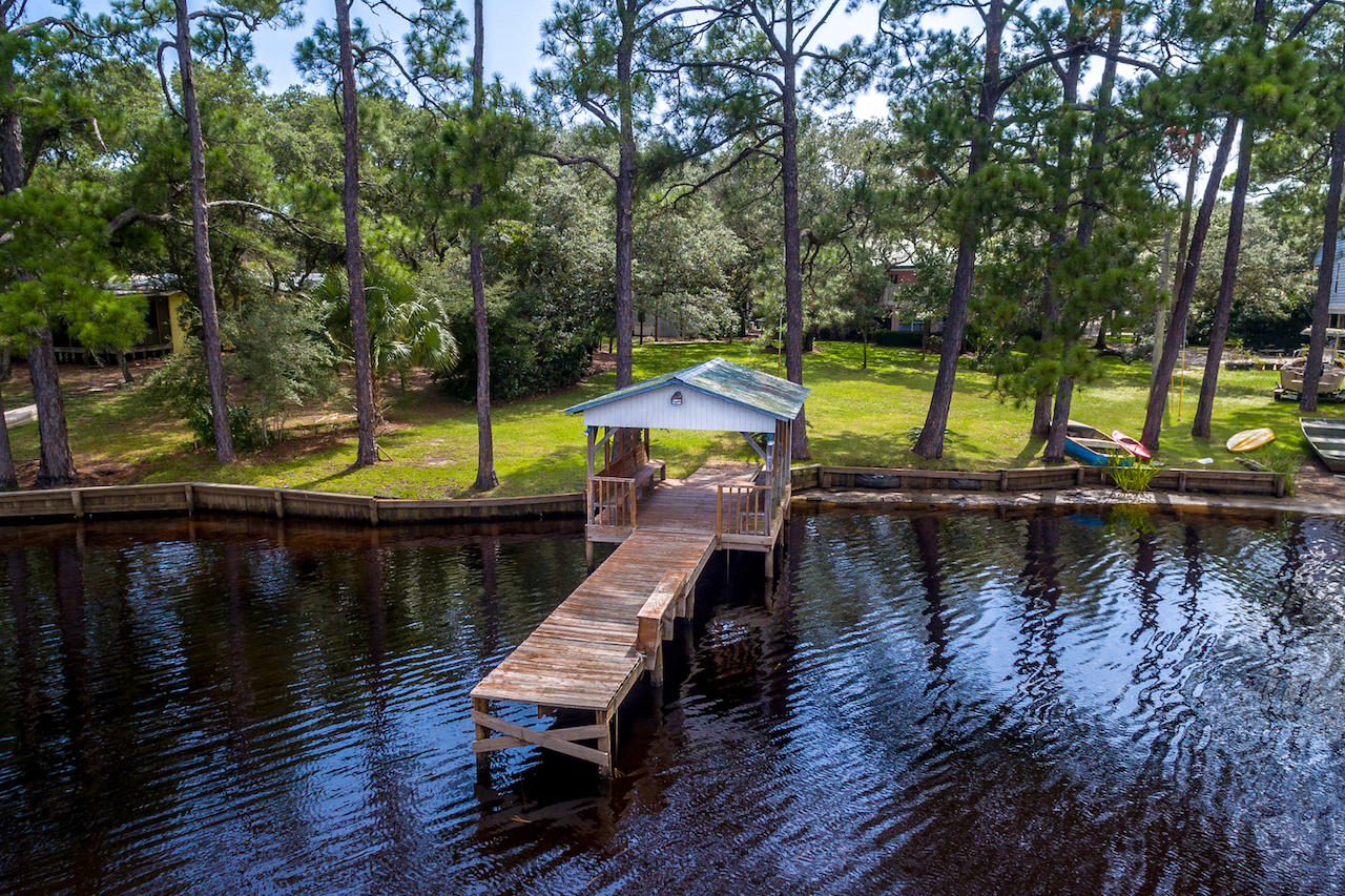 79 Garfield Street Santa Rosa Beach, FL 32459 - Photo 8 of 49 a view of a lake with sitting area and lake view