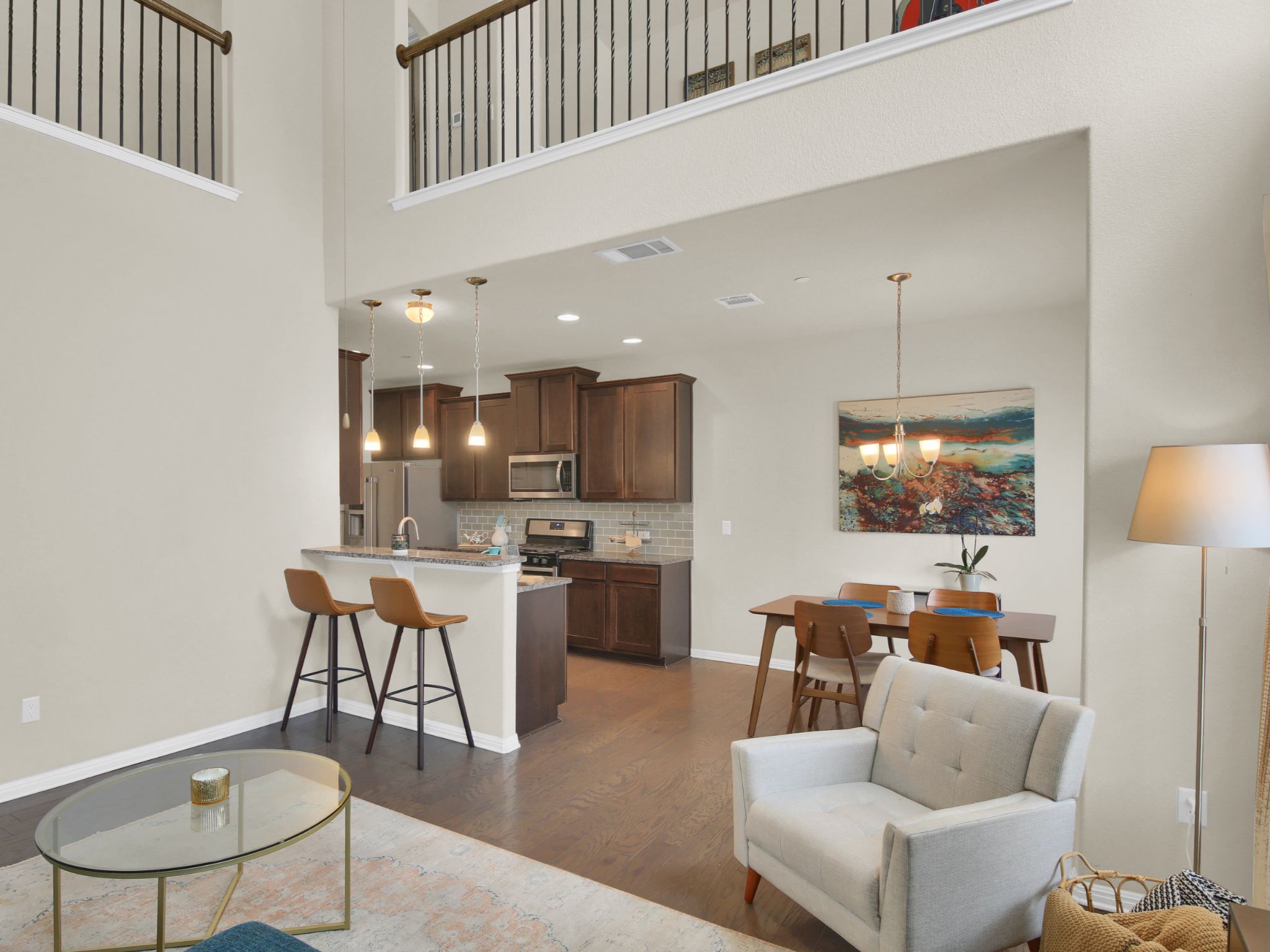 1600 Airedale Road, Unit 2601 Austin, TX 78748 - Photo 5 of 26 The open-concept layout features a well-appointed kitchen and dining area, flowing seamlessly into the living space.