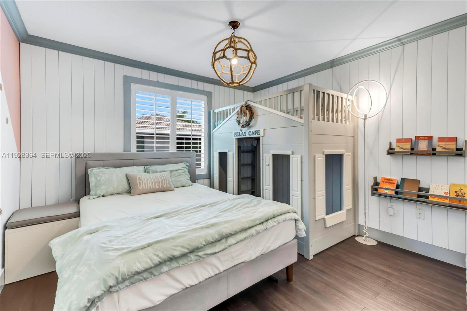 16437 Southwest 28th Street Miramar, FL 33027 - Photo 25 of 34 a bedroom with a bed a dresser and windows