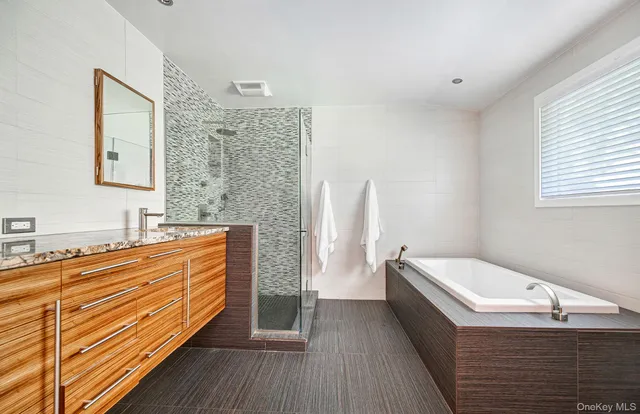 a bathroom with a sink and a bathtub