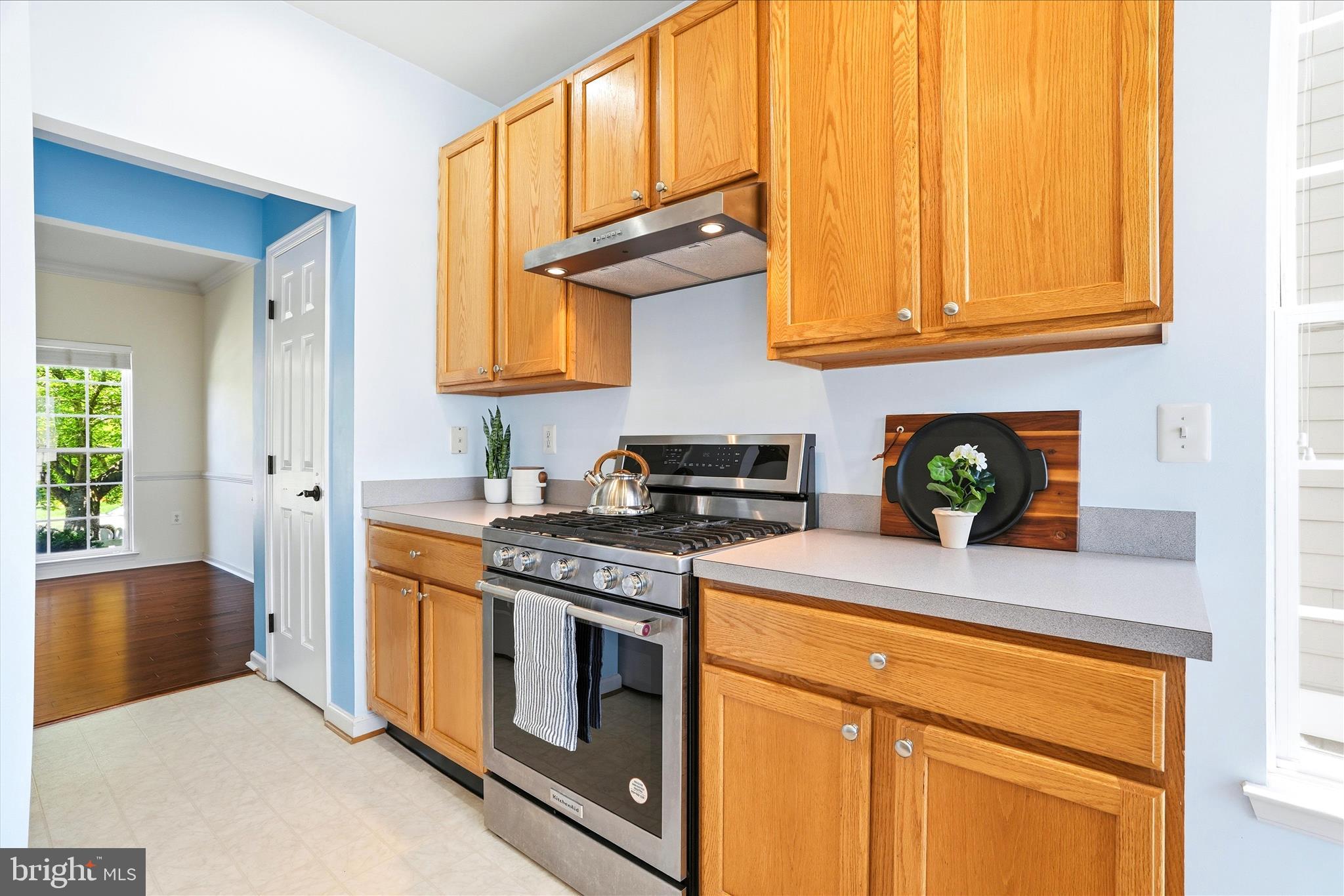 9009 Bealls Farm Road Frederick, MD 21704 - Photo 9 of 41 a kitchen with stainless steel appliances granite countertop a stove a sink and a refrigerator