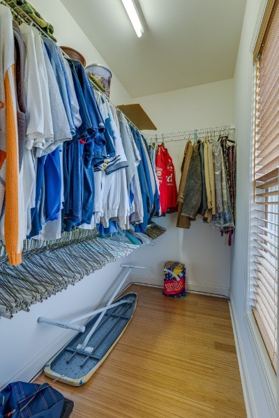 4664 New Cut Road Greenbrier, TN 37073 - Photo 19 of 85 a view of walk in closet with clothes and shoes