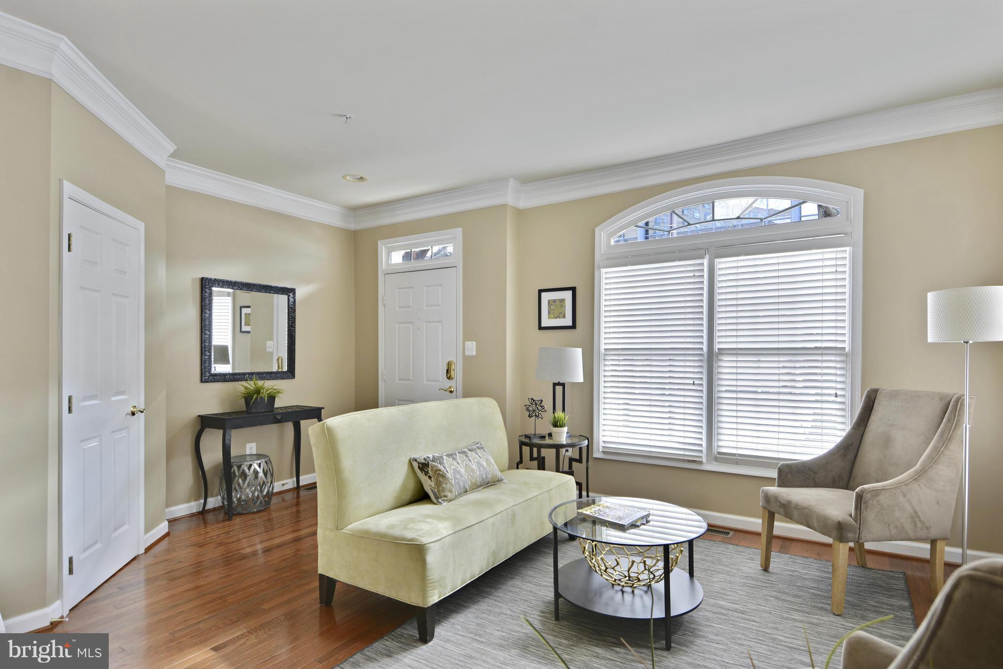 8523 2nd Avenue Silver Spring, MD 20910 - Photo 2 of 30 a living room with furniture and window