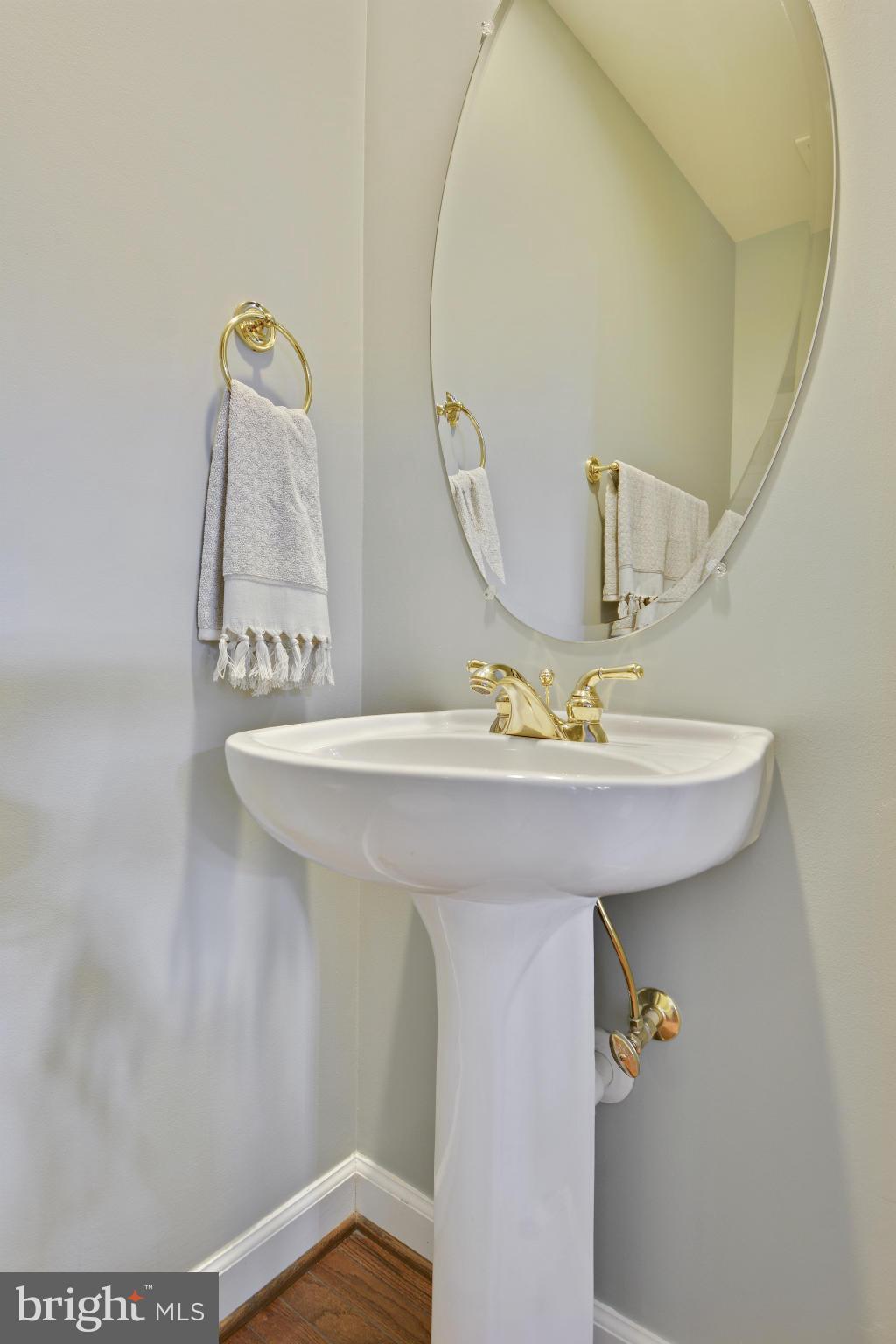 8523 2nd Avenue Silver Spring, MD 20910 - Photo 13 of 30 a bathroom with a sink and a mirror