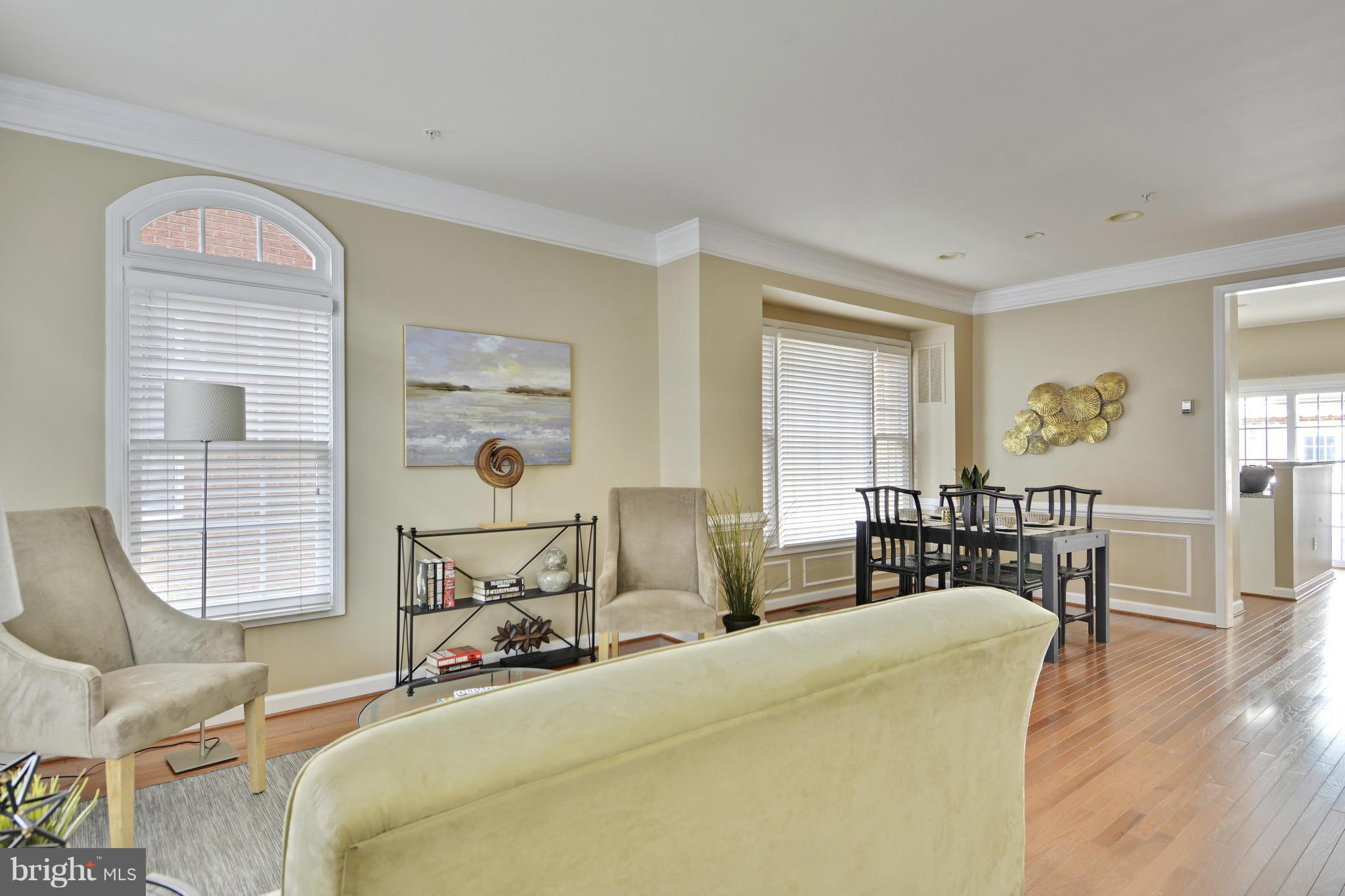 8523 2nd Avenue Silver Spring, MD 20910 - Photo 3 of 30 a view of a livingroom with furniture and windows