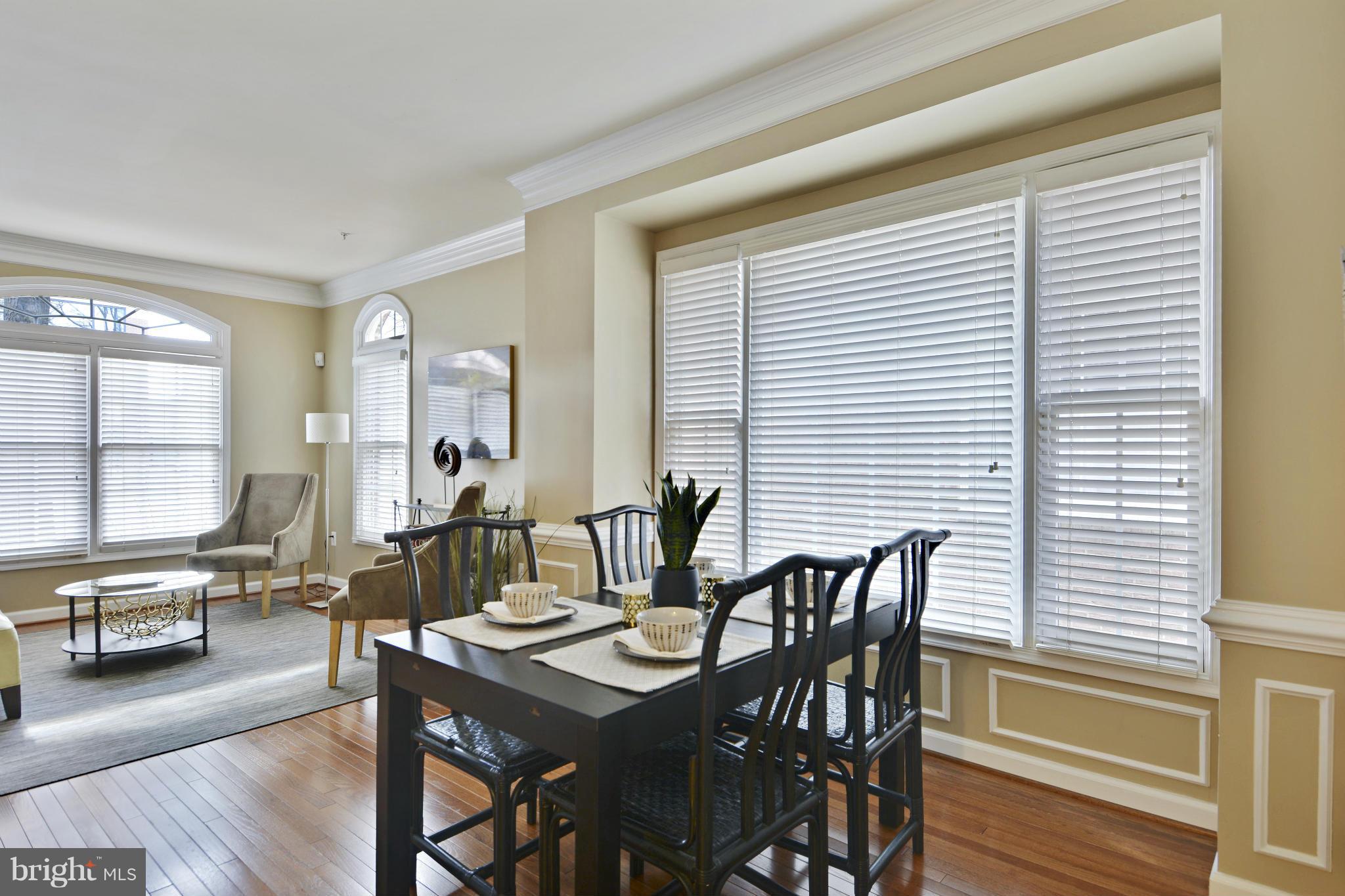 8523 2nd Avenue Silver Spring, MD 20910 - Photo 5 of 30 a view of a dining room with furniture and wooden floor