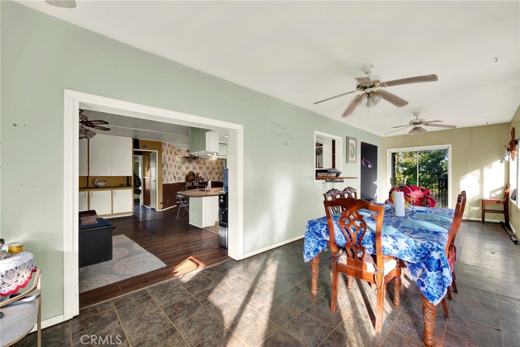 14721 Nevis Road Red Bluff, CA 96080 - Photo 32 of 50 a living room with furniture and wooden floor