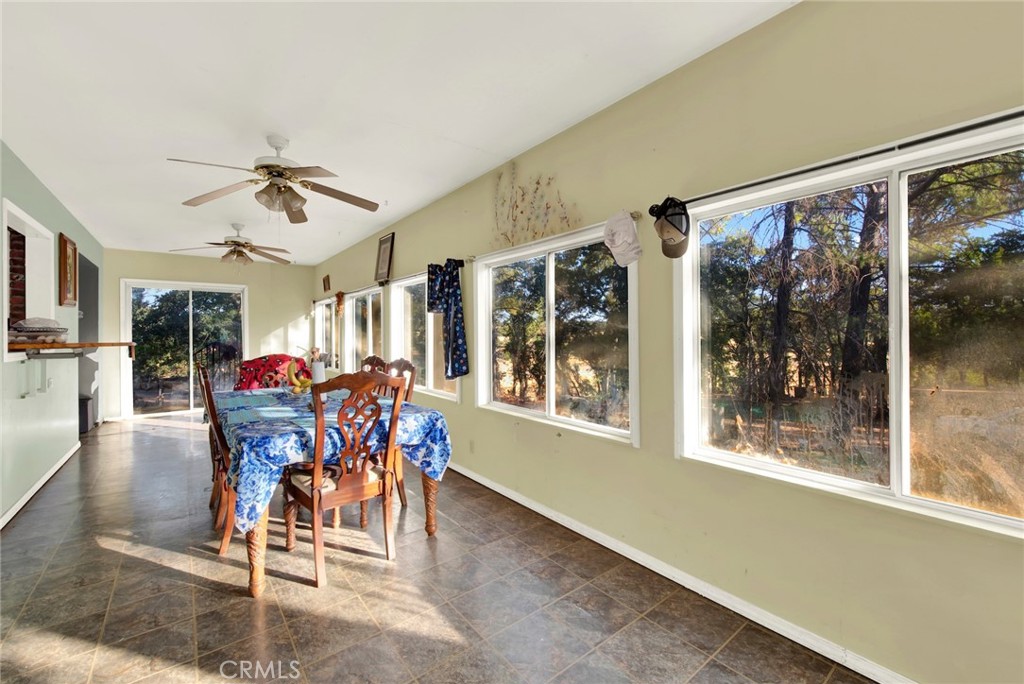 14721 Nevis Road Red Bluff, CA 96080 - Photo 33 of 50 a view of a dining room with furniture window and outside view