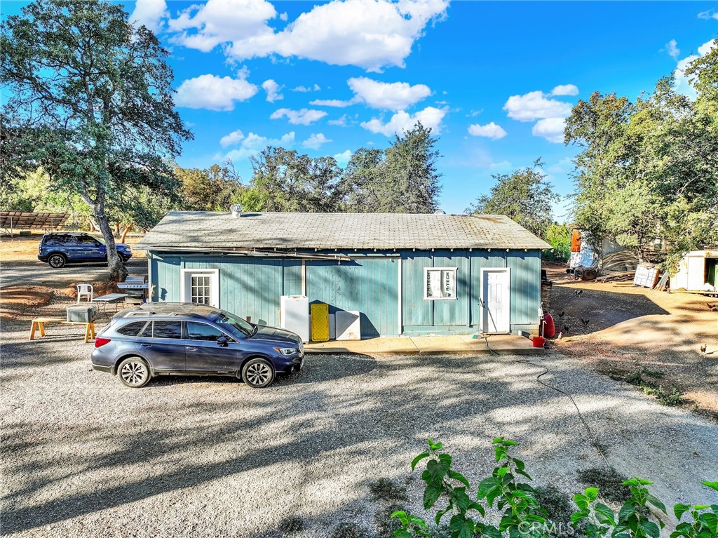 14721 Nevis Road Red Bluff, CA 96080 - Photo 6 of 50 a front view of a house with parking space