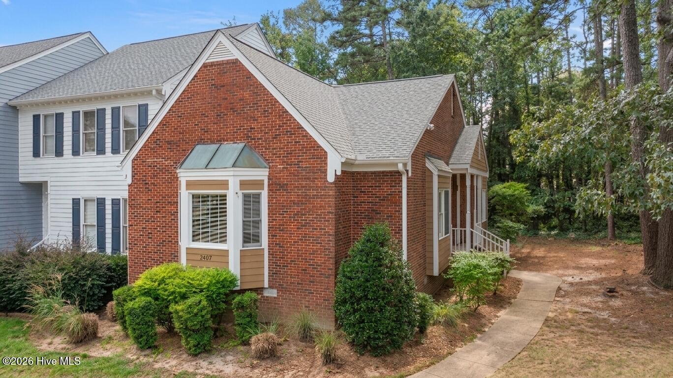8407 Wycombe Lane Raleigh, NC 27615 - Photo 1 of 18 Pristine 2 br 2 bath corner unit NEW ROOF 2024!