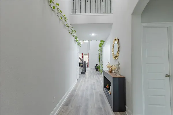 a view of entryway with wooden floor