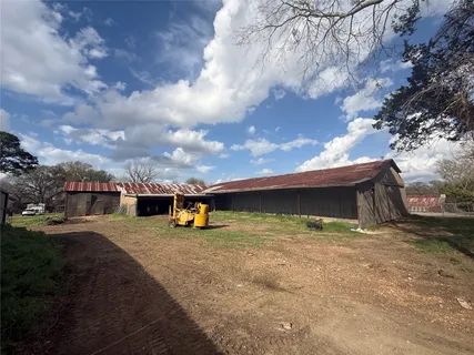 a view of outdoor space with swimming pool and furniture