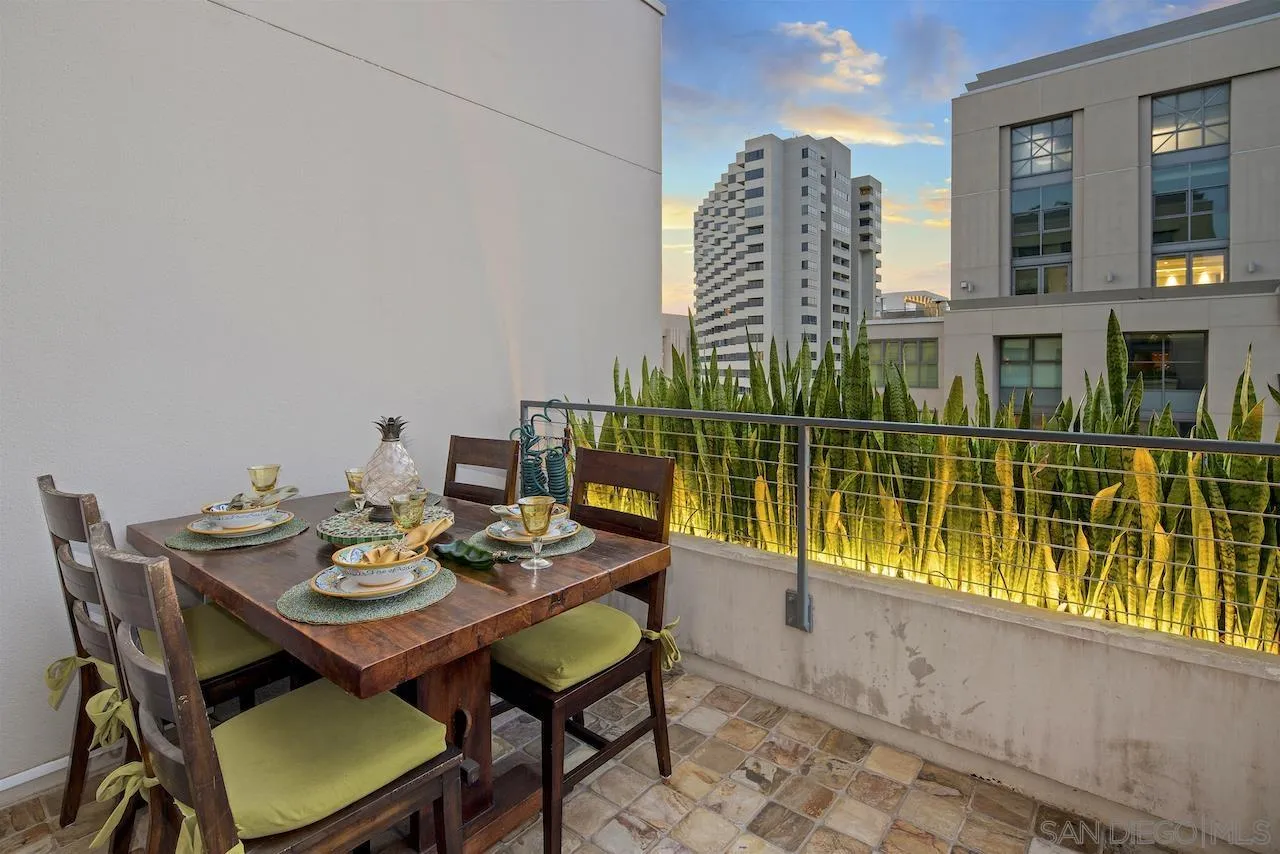 645 Front Street, Unit 2101 San Diego, CA 92101 - Photo 17 of 32 a view of a dining room with furniture and front door
