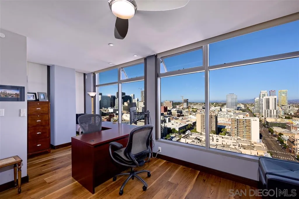 645 Front Street, Unit 2101 San Diego, CA 92101 - Photo 28 of 32 a view of a workspace with furniture and chandelier